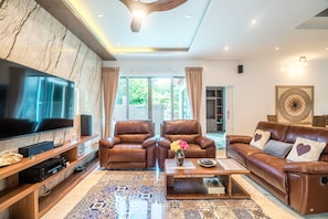 Deluxe Villa | Living area | 40-inch LED TV with digital channels, TV
