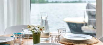 Modern houseboat with air conditioning in port