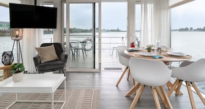 Modern houseboat with air conditioning in port