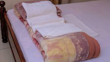 Blackout drapes, free WiFi, bed sheets