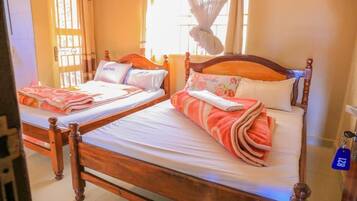 Blackout drapes, free WiFi, bed sheets