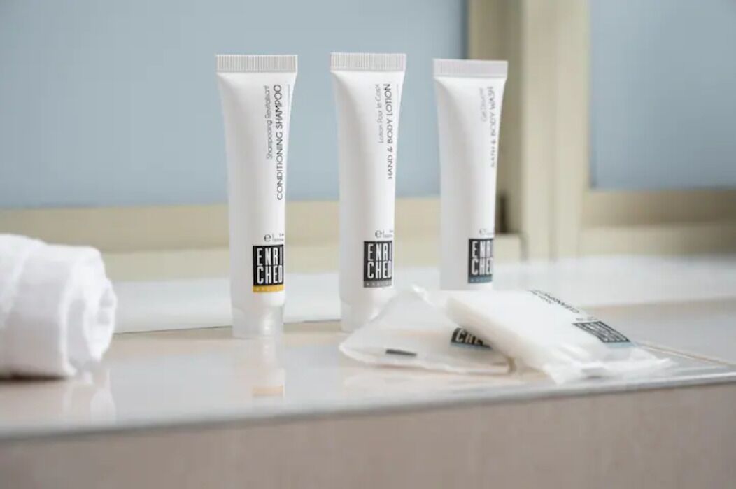 Combined shower/tub, hair dryer, towels, soap