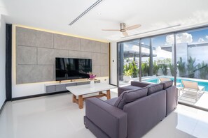 Luxury Villa | Living area | 40-inch LED TV with digital channels, TV - Trendy Modern Pool Villa Sunset Garden 4 (Rawai)