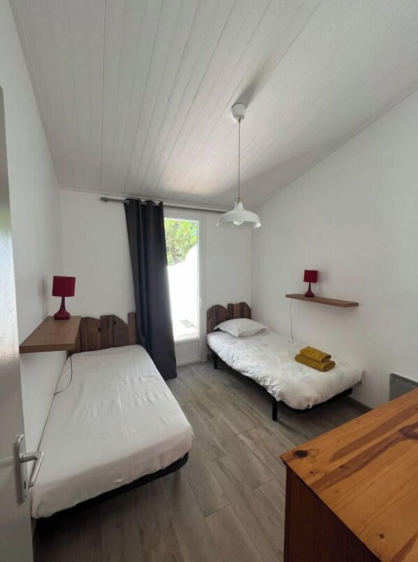 3 bedrooms, iron/ironing board, travel cot, bed sheets