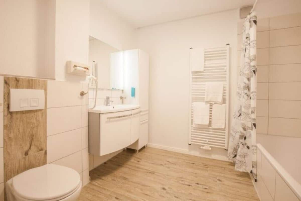 Baño | Regadera y toallas