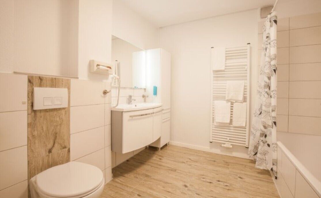 Baño | Regadera y toallas 