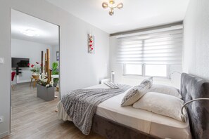 1 chambre, bureau, fer et planche à repasser, Wi-Fi gratuit
