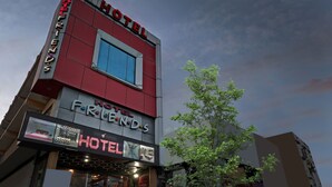 A hotel with a prominent sign reading "HOTEL FRIENDS" and "HOTEL FRIENDS" on the facade. - Itsy Hotels Friends (Haldwani)
