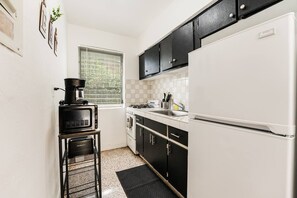 Fridge, microwave, oven, stovetop - Experience the vibrant spirit of Little Havana! Stay in the perfect 1BR/1BA home just minutes from Brickell and steps from Little Havana’s cafés, music, and culture. (Miami)