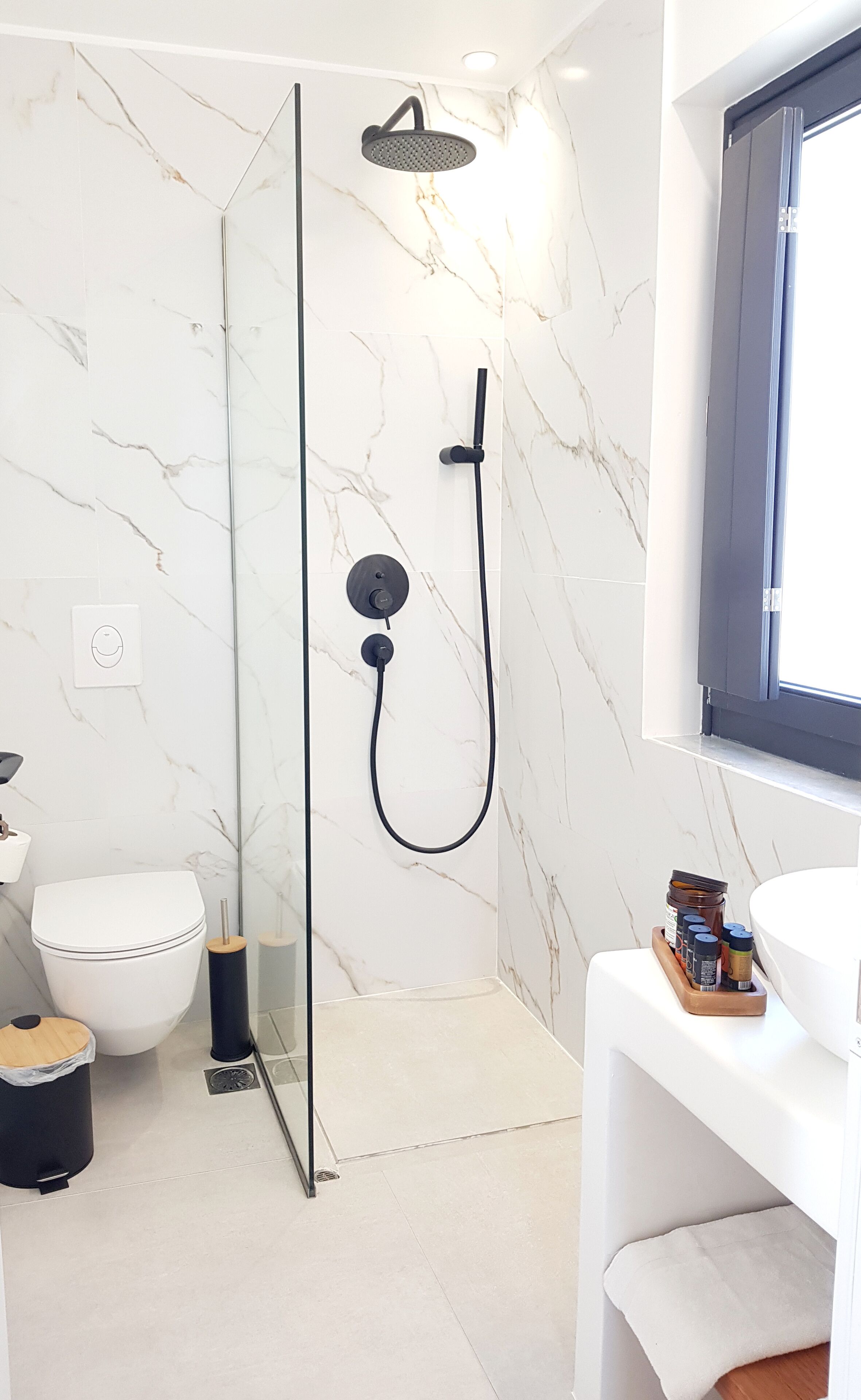comfort studio suite | bathroom | shower, rainfall showerhead, hair dryer, slippers