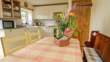 Fridge, dishwasher, electric kettle, cookware/dishes/utensils