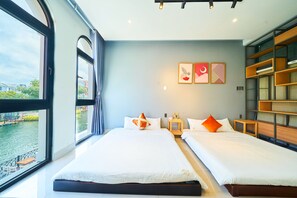Habitación triple Signature, balcón | Wifi gratis