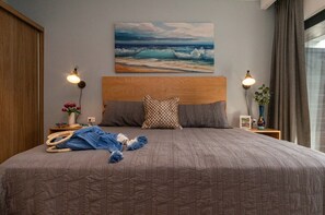 1 bedroom, desk, iron/ironing board, travel crib
