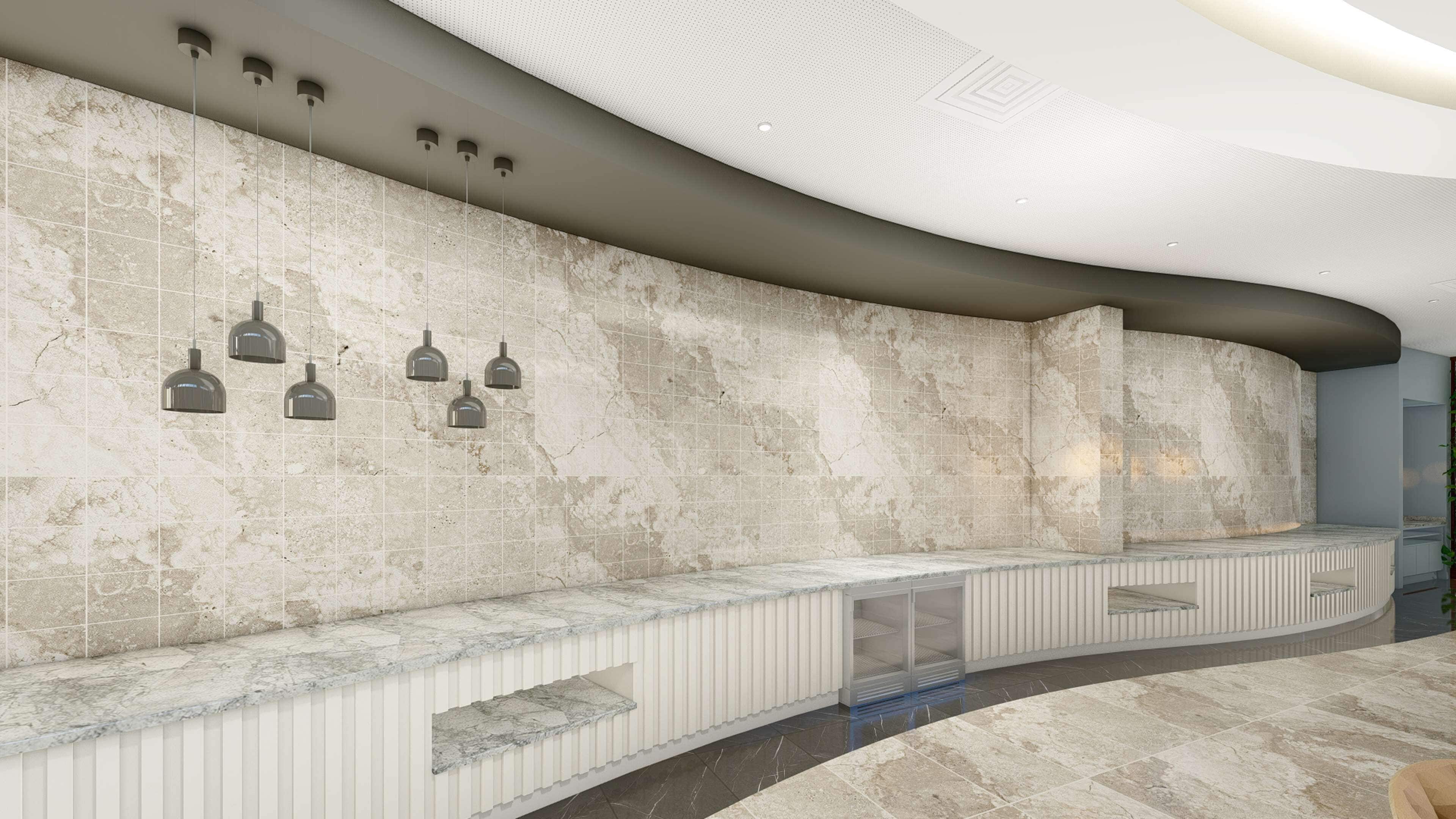 A modern bathroom with a curved marble countertop, a large mirror, and pendant lights.