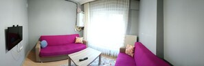 Departamento | Escritorio, espacio para trabajar con laptop y ropa de cama
