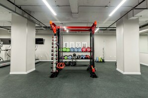 Work out in style with a fully equipped gym featuring weightlifting stations, treadmills, and stationary bikes.