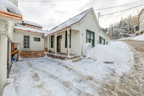 A snow-covered residential property with a front porch, a mailbox, and a visible house number 43. - Walk-to-Ski Historic Old Town Cottage with Sauna (Park City)
