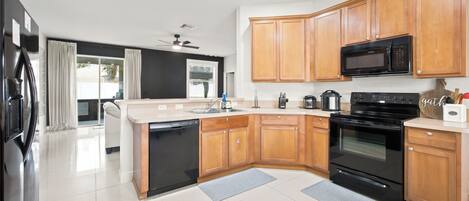 Coffee/tea maker, fridge, microwave, oven