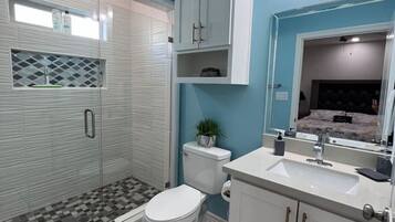 Bathtub, hair dryer, towels