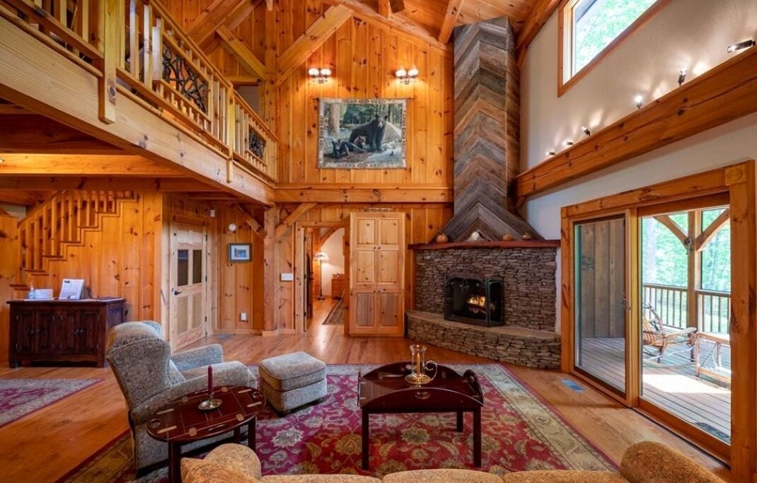 Great room with gas fireplace and access to screened in porch