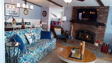 Smart TV, fireplace, DVD player, books