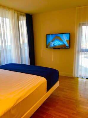 Apartemen | 2 kamar tidur, setrika/meja setrika, Wi-Fi gratis, dan seprai linen