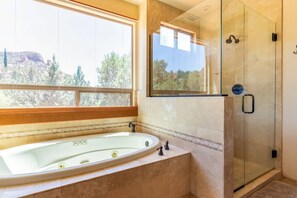 Bathtub, hair dryer, towels, soap