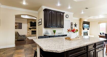 The ultimate resort ranch style pool home on nearly a half acre!