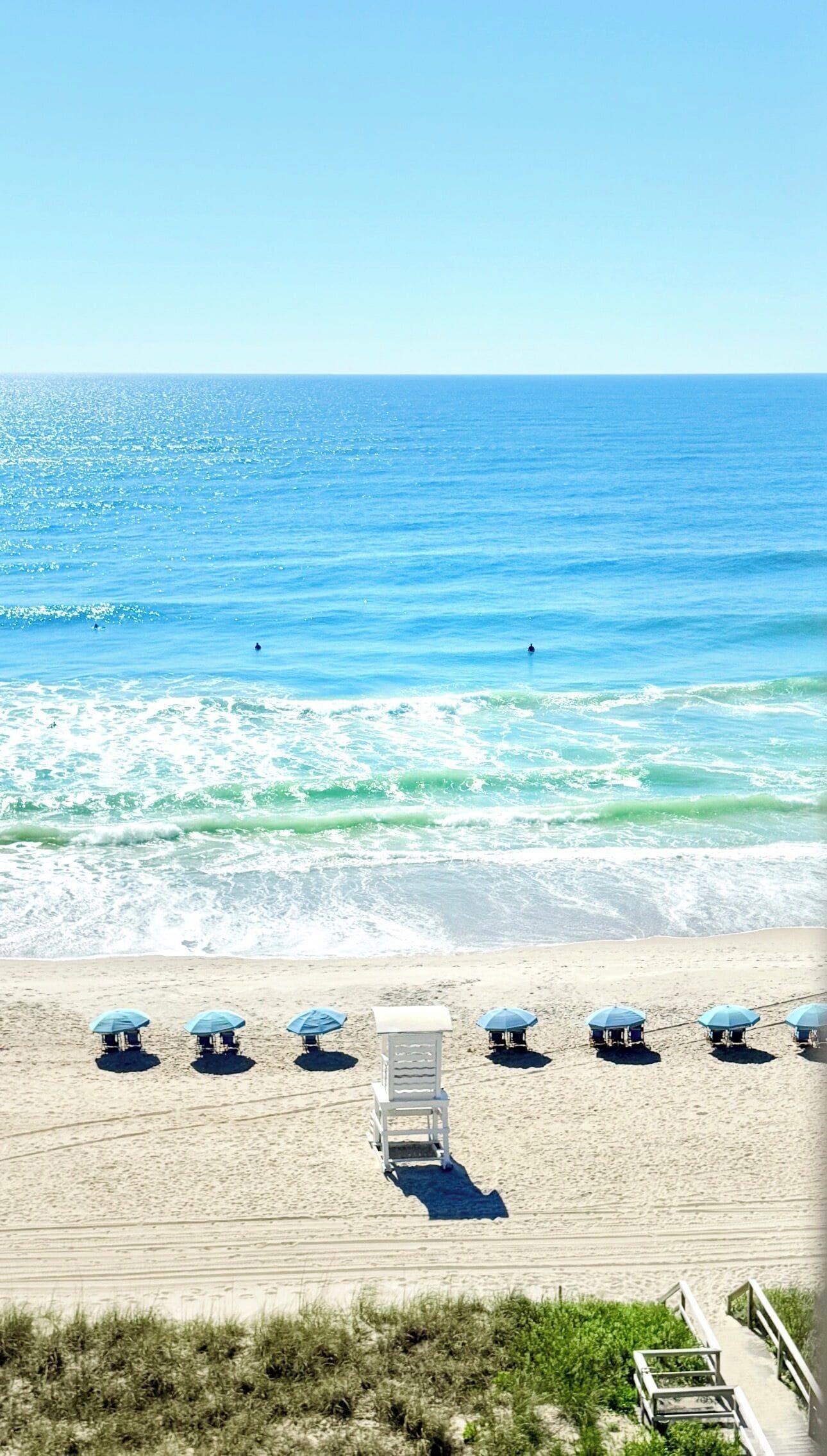 On the beach, sun-loungers, beach towels