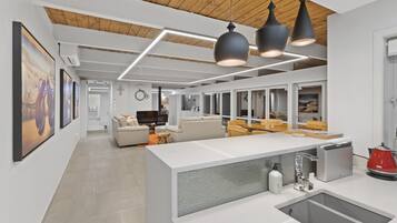 Villa | Private kitchen | Full-sized fridge, microwave, oven, dishwasher