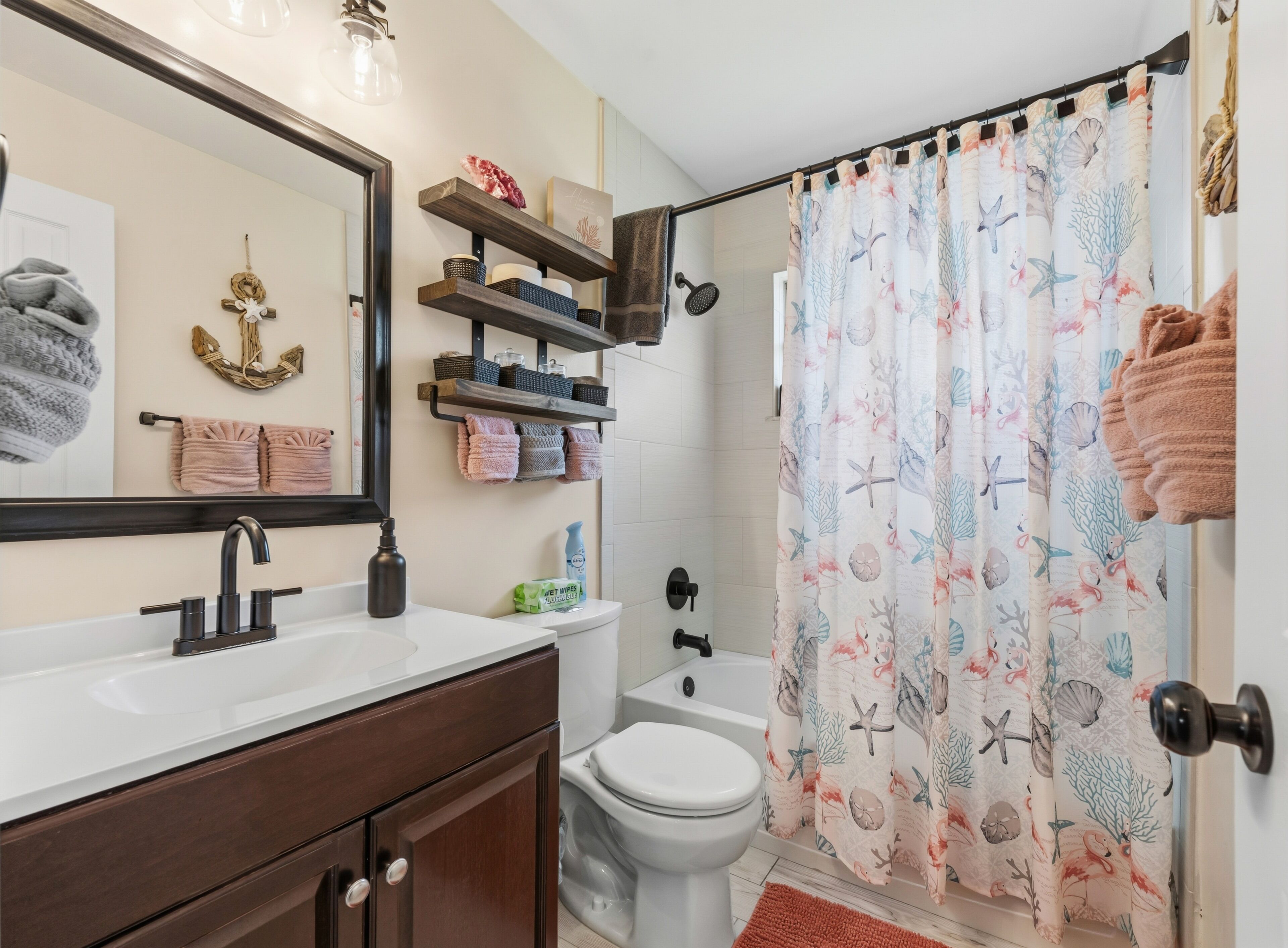 Combined shower/tub, hair dryer, towels, soap