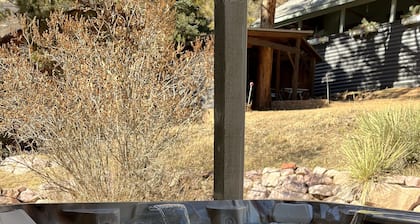 5 bd, 4 bth, A/C, new mattresses, hot tub, waterfalls, walk to town, trails!