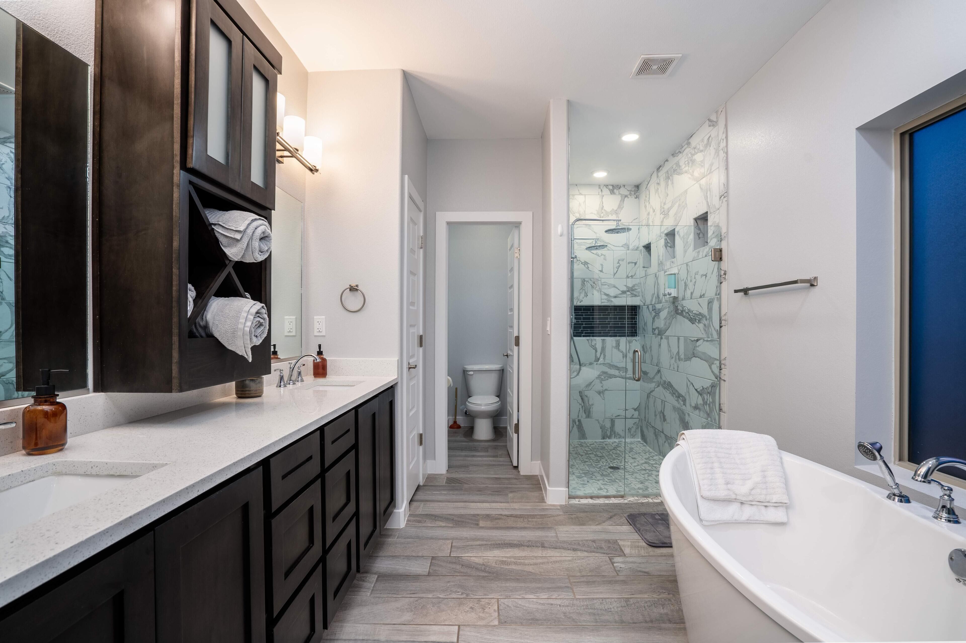 Combined shower/tub, hair dryer, towels, soap