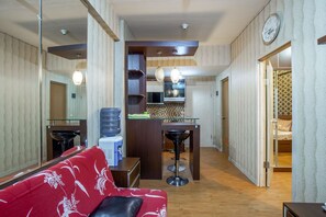 Standard Apartment | Private kitchen | Fridge, stovetop, electric kettle, cookware/dishes/utensils - Angela Room (Bekasi)