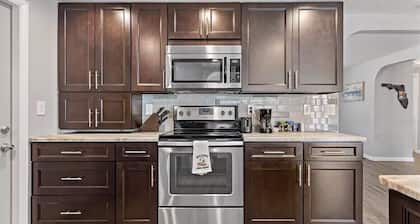 Lakehouse Living w/ Firepit and Boat Dock to relax and Enjoy the Sunset