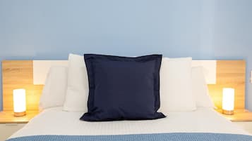 1 habitación, tabla de planchar con plancha y cuna de viaje