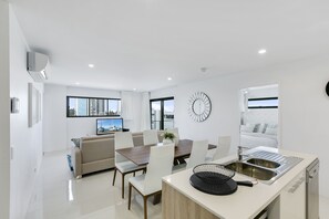 2 Bedroom Apartment | Private kitchen | Full-size fridge, microwave, oven, stovetop - Spice Broadbeach - GCLR (Broadbeach Waters)