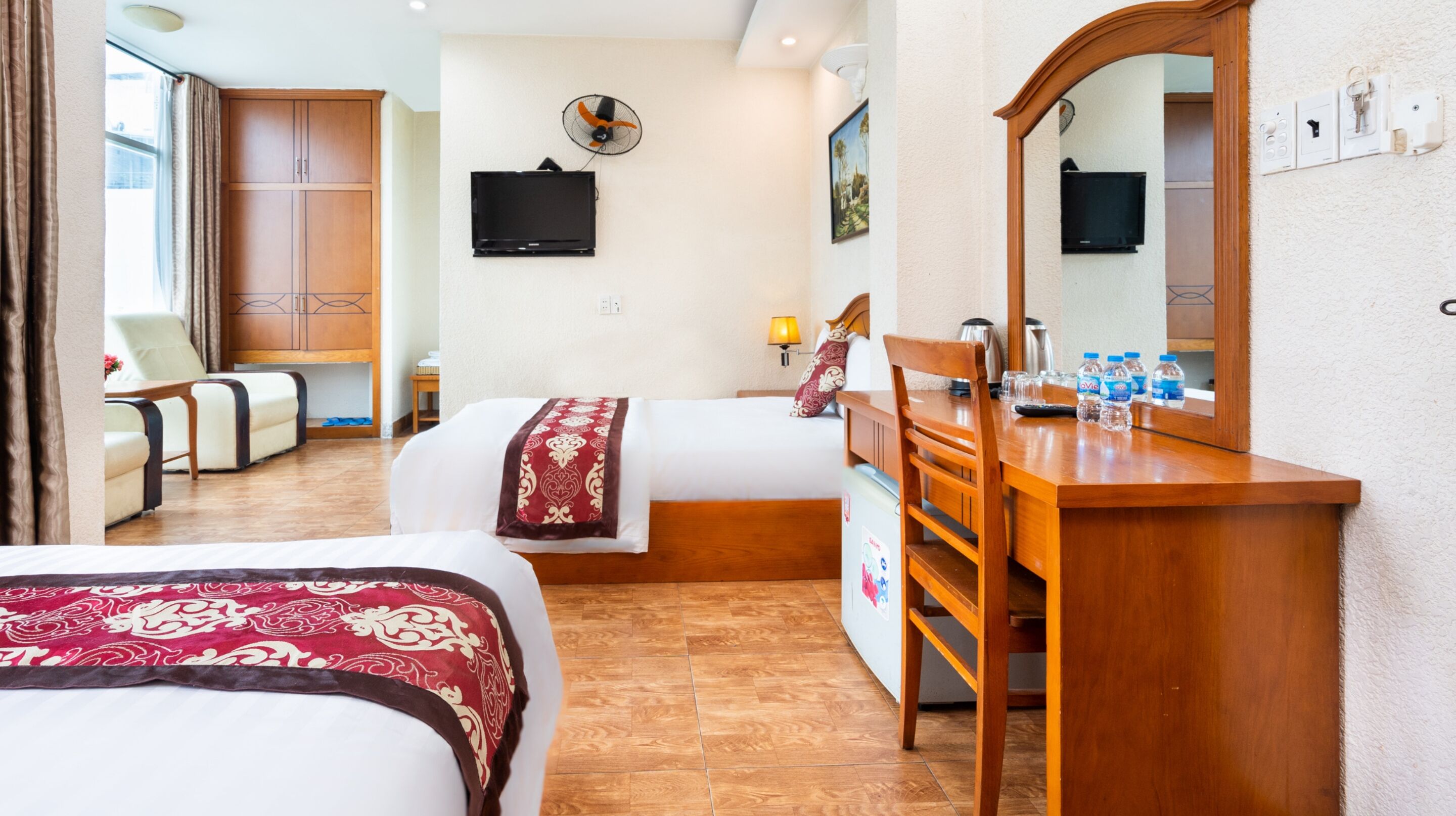 superior quadruple room, 2 queen beds, balcony, city view | hypo-allergenic bedding, minibar, desk, laptop workspace