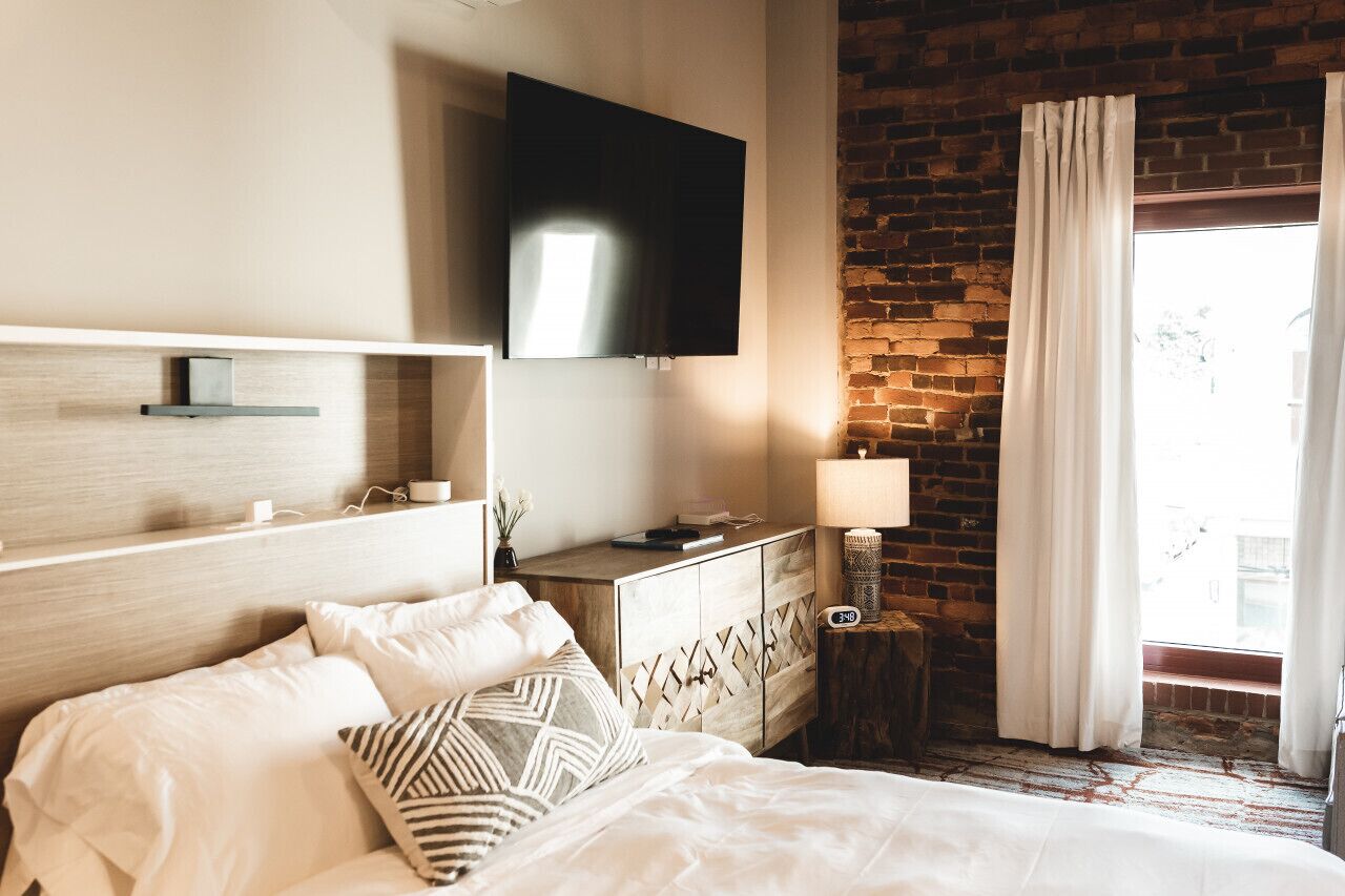 Ropa de cama de alta calidad y tabla de planchar con plancha