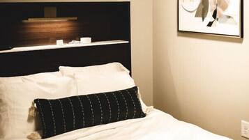 1 bedroom, premium bedding, iron/ironing board, travel crib