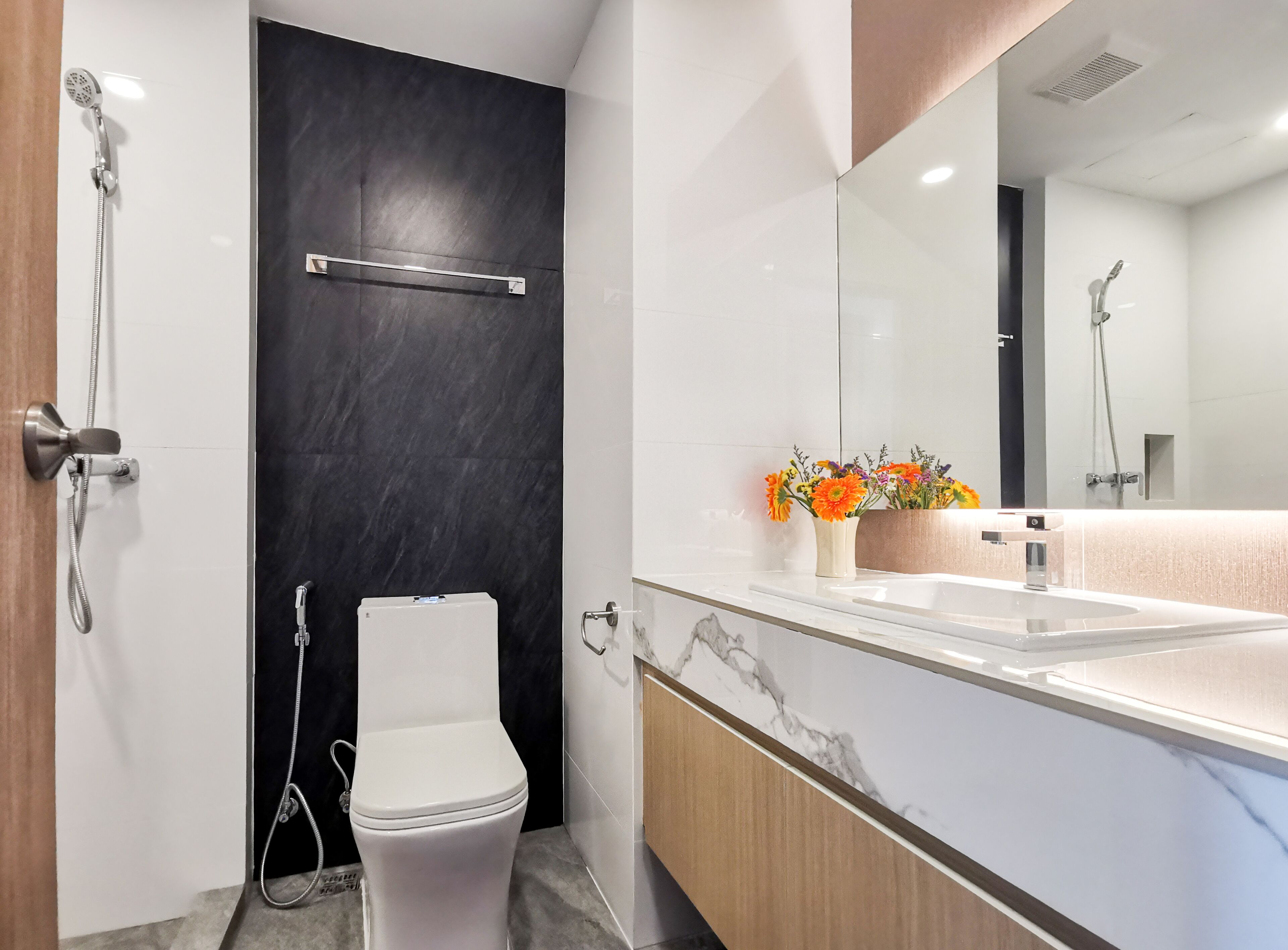 Gratis toiletartikelen, een haardroger, badjassen, pantoffels