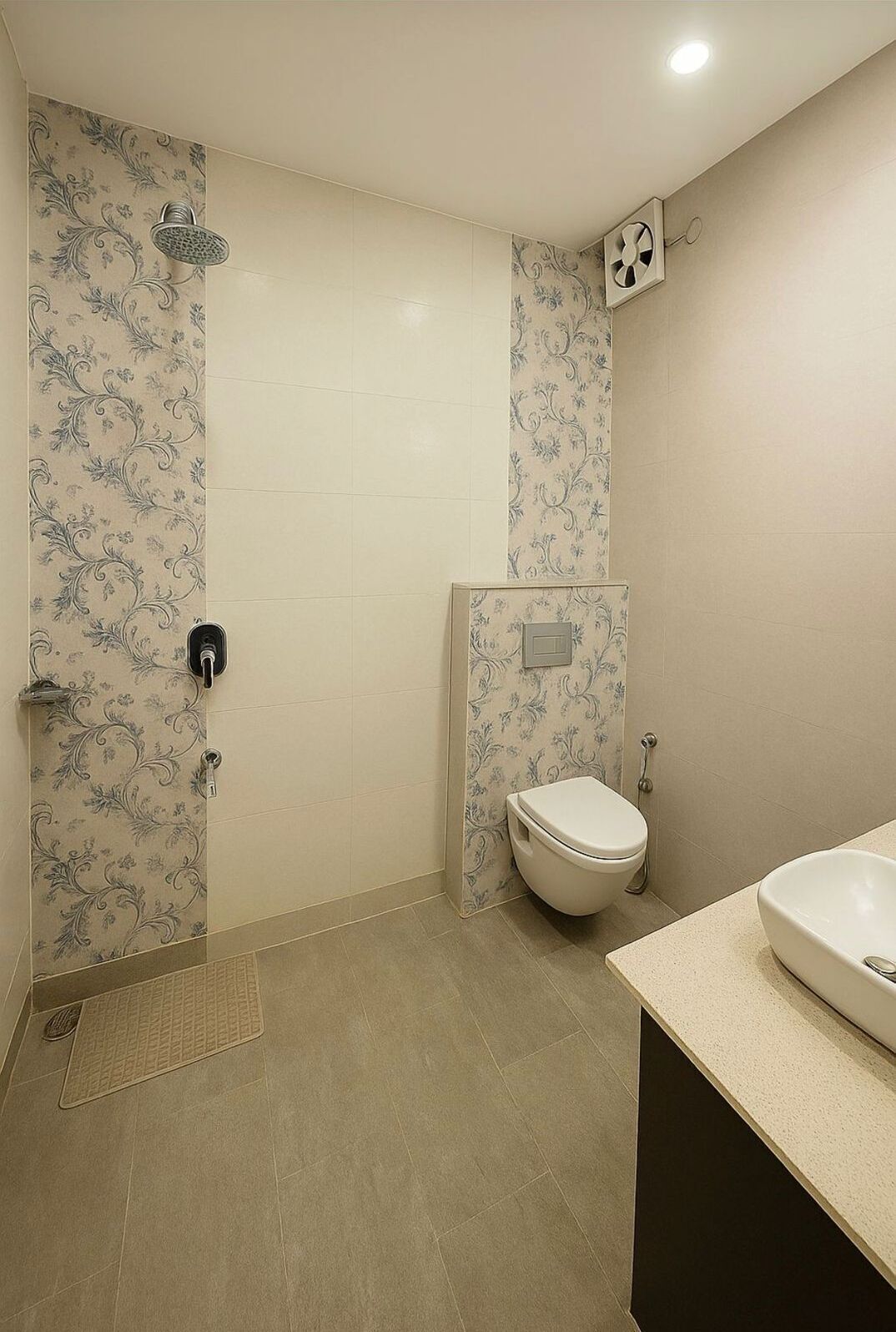 A bathroom with a toilet, bidet, and shower.