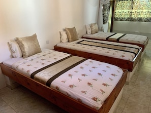 Traditional Triple Room | Desk, blackout drapes, free WiFi - NEW PAMOJA RESORT (Arusha)