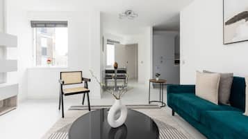 Apartment | Living area | 32-inch flat-screen TV with cable channels, TV, Netflix
