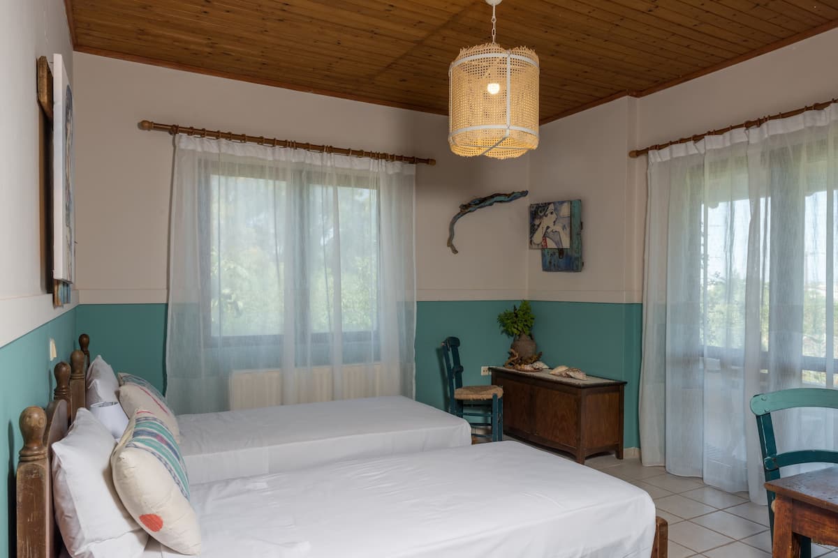 Chambre Standard avec lits jumeaux, 2 lits une place | Décoration personnalisée, ameublement personnalisé, Wi-Fi gratuit