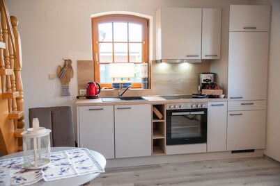 Ruhige Ferienwohnung mit Blick auf Deich- Ortskern nah