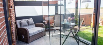 Ruhige Ferienwohnung mit Blick auf Deich- Ortskern nah