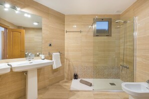 Bathtub, hair dryer, towels