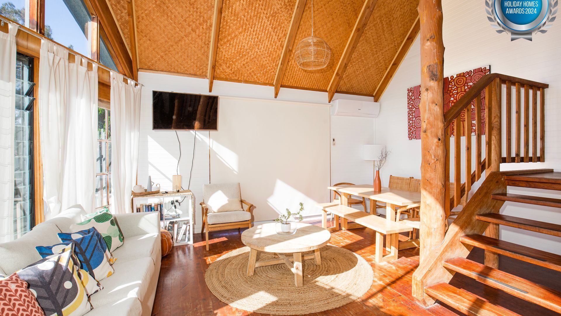 Smart TV, fireplace, books, stereo