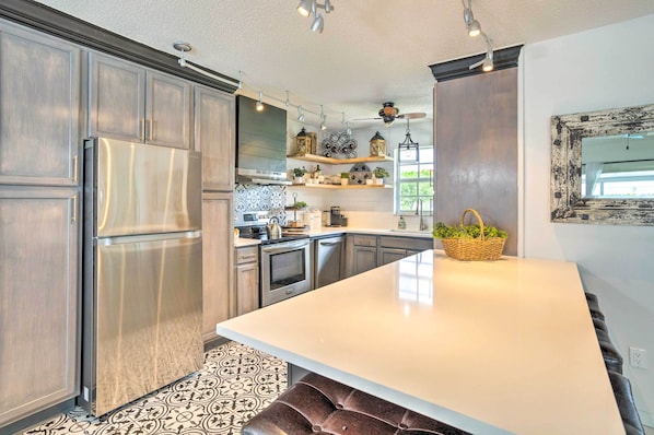 Fridge, microwave, stovetop, dishwasher - 'Tropical Landing' Stuart Home w/ Pool + Grill! (Stuart)